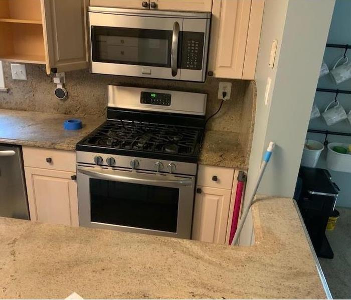 Kitchen with sewage water on countertops