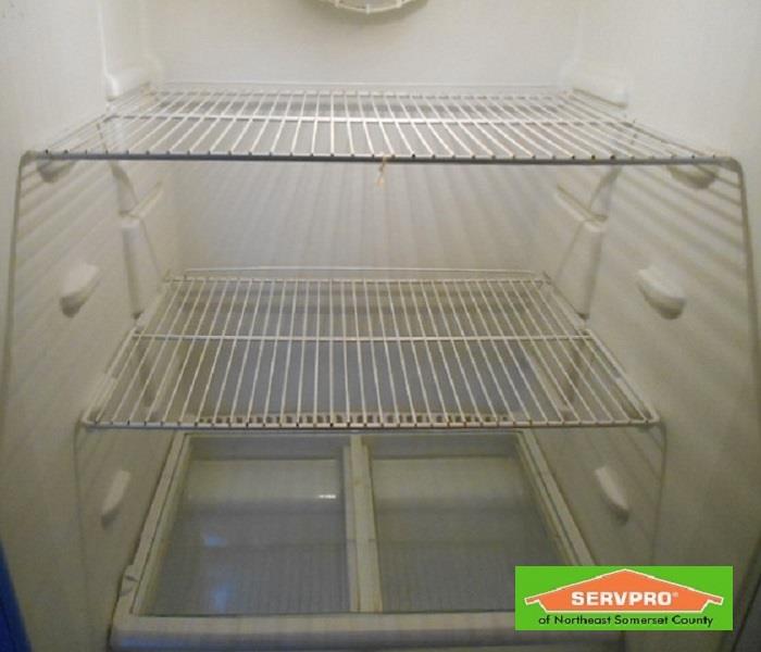 A empty clean refrigerator. 