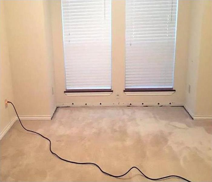 A room with wet carpeting. 